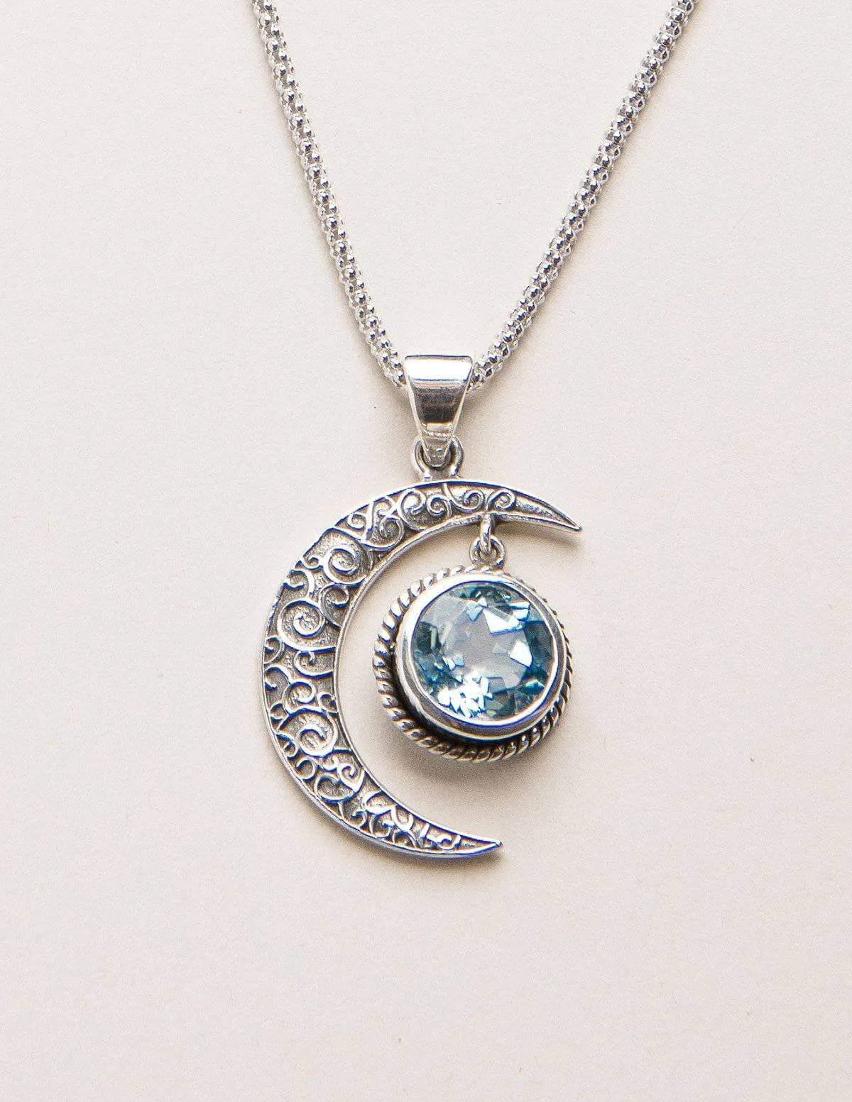 Blue Topaz Silver Moon Pendant