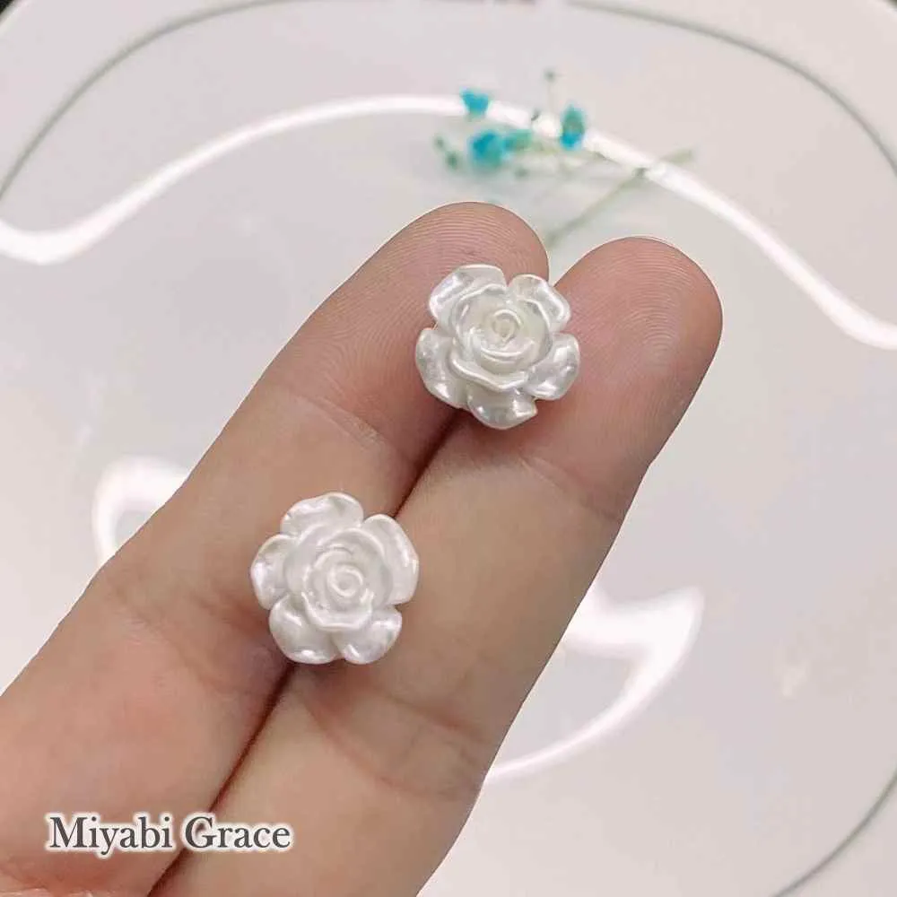 Small White / Light Orange Rose Invisible Clip On Earrings