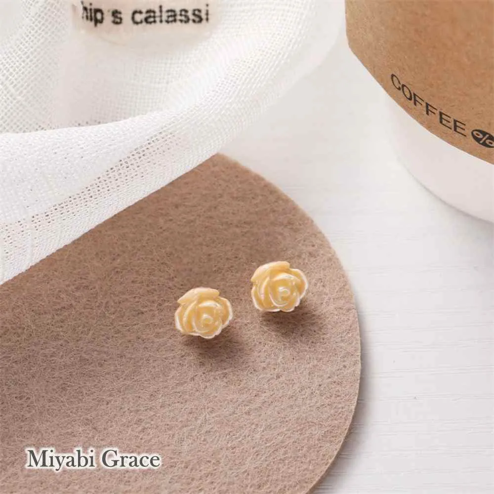 Small White / Light Orange Rose Invisible Clip On Earrings